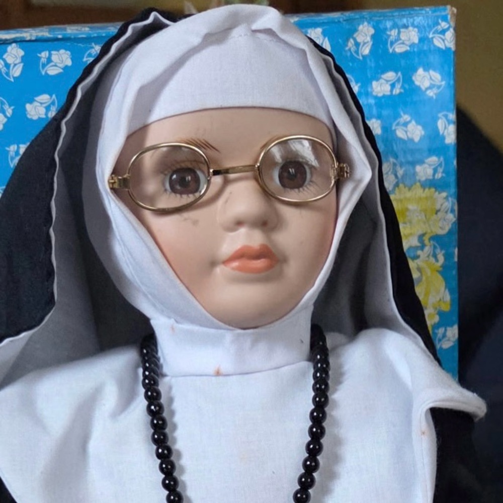 Nun Porcelain Doll with Cross Necklace